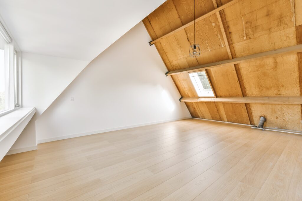 Lovely attic room with wood ceiling